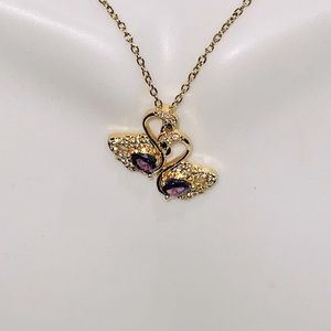 Rare tanzanite VSSS D clarity beautiful swan necklace in 10k Yellow Gold Vermeil